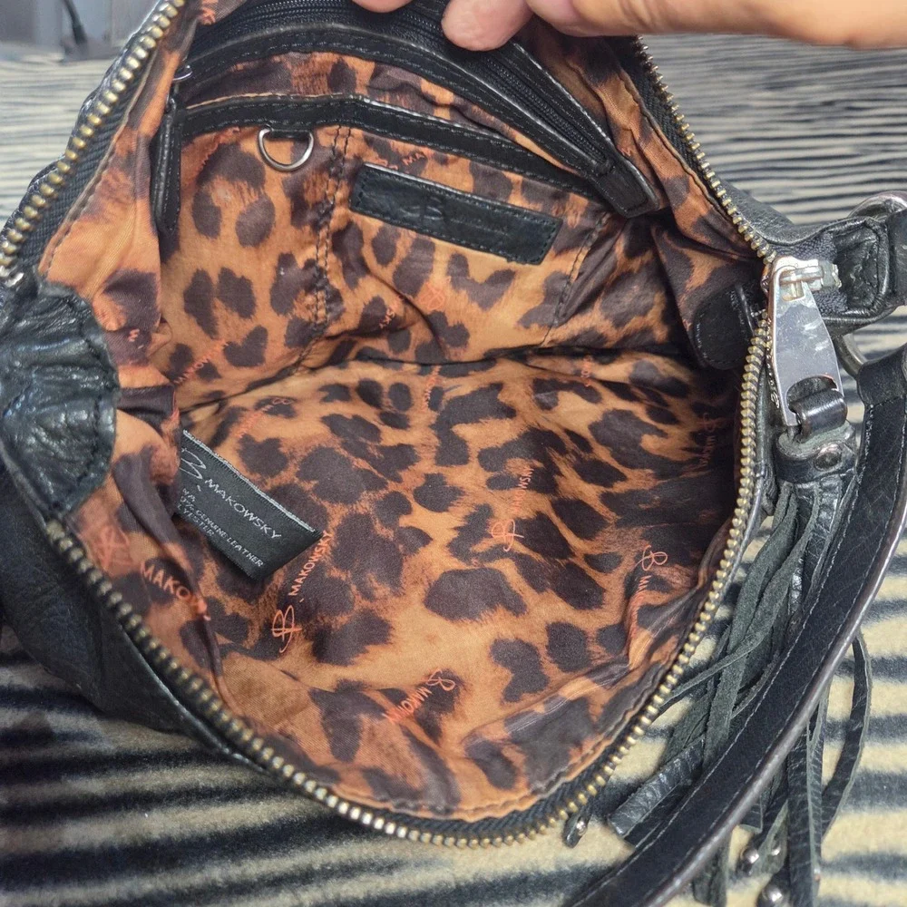 B. Makowsky Black Pebbled Leather Crossbody Bag Pleated Tassel Leopard Print